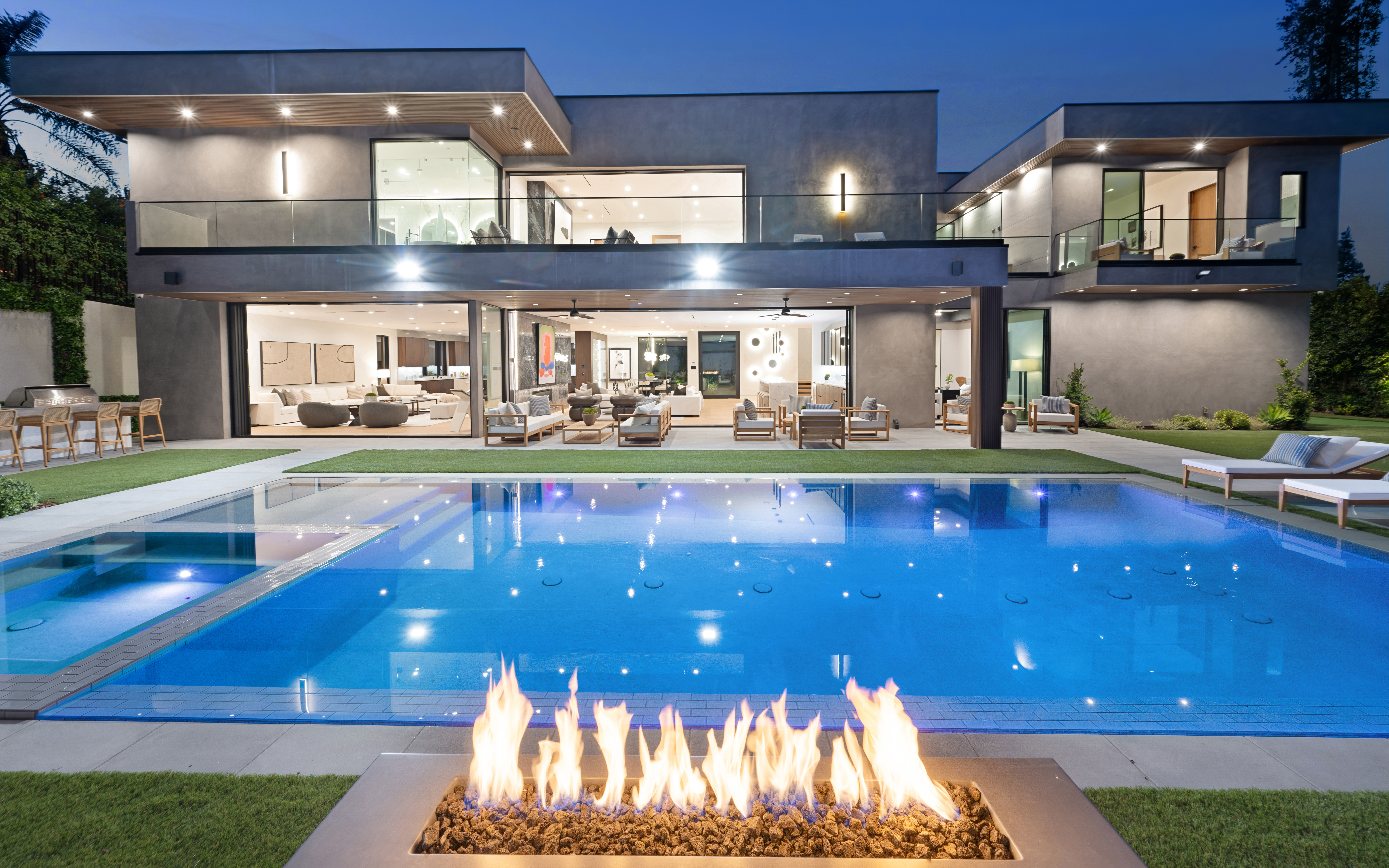 Majestic backyard with pool and waterfall
